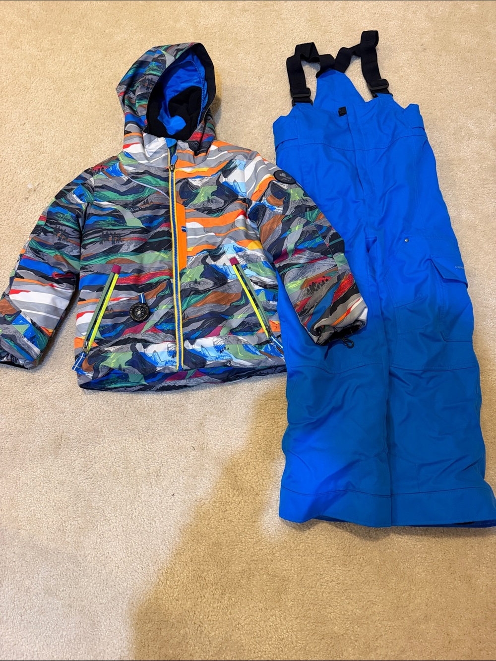 Obermeyer Children's Colorful Patterned Winter Jacket with Bright Blue Snow Bibs
